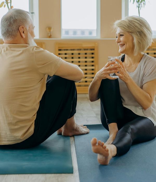 A person looking energized and happy after a yoga session.